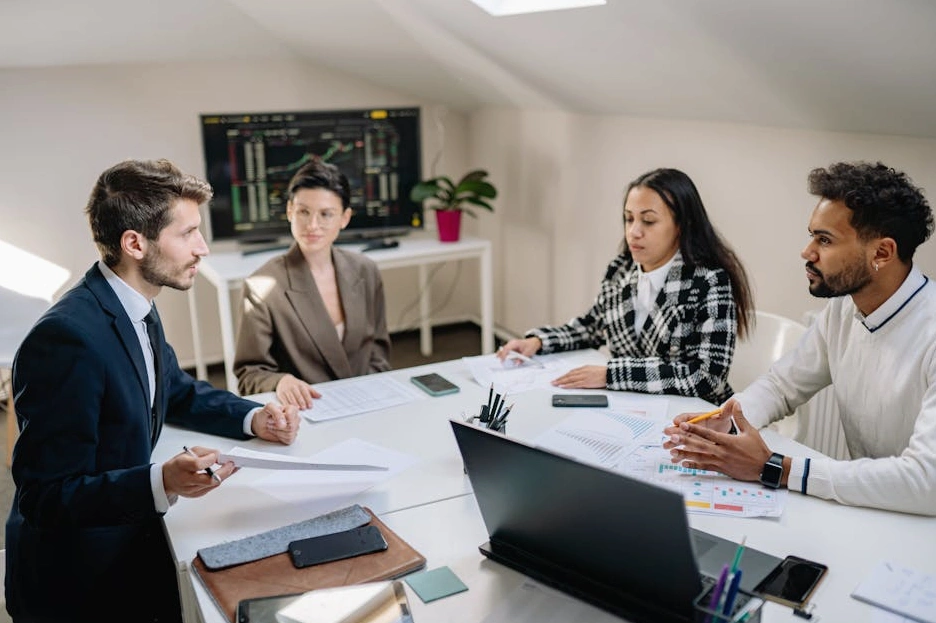A diverse team of financial experts collaborating in a modern office.